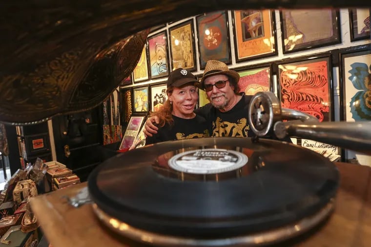The iconic main line music store Gold Million records is closing, and they are selling their entire inventory in Bryn Mawr, Friday, August 17, 2018. Owners Max Million and Harold Gold behind an Edison Victrola.
