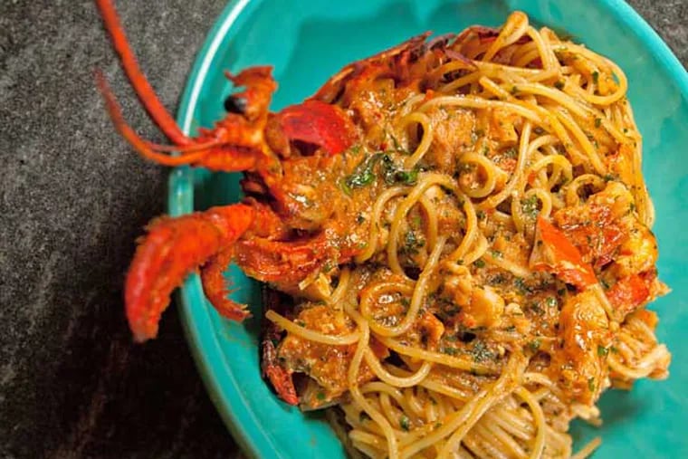 Spaghetti with lobster, basil and tomato as served at Osteria at the Moorestown Mall.  ( DAVID M WARREN / Staff Photographer )