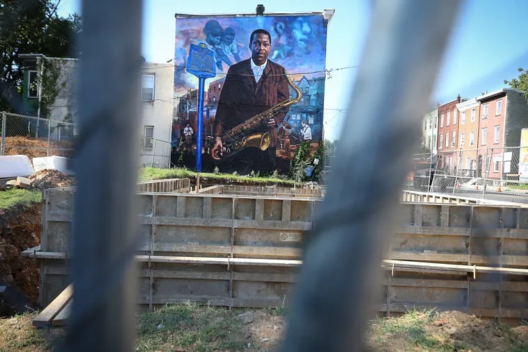 New construction will cover the mural of musician John Coltrane near the corner of 29th and Diamond Streets  in Philadelphia, Pa. Work has already begun on the lot next to the mural on July 28, 2020. .