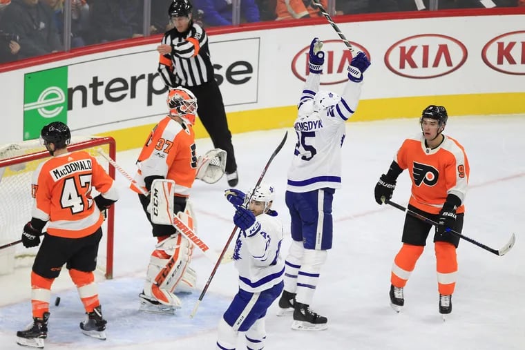 James van Riemsdyk, second from right, of the Maple Leafs celebrates after scoring against the Flyers last season.