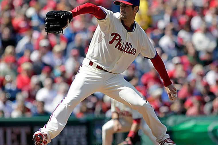 What do you make of Cole Hamels now that the Phillies' ace has crapped out in his first two starts? (H. Rumph Jr/AP)